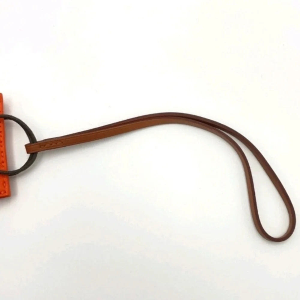 HERMÈS ORANGE LEATHER MINI POUCH BAG CHARM KEY HOLDER + BOX - Picture 11 of 12